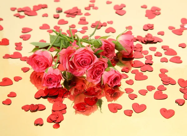 Pink roses and confetti — Stock Photo, Image