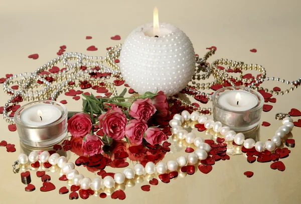 Svíčky a růže — Stock fotografie