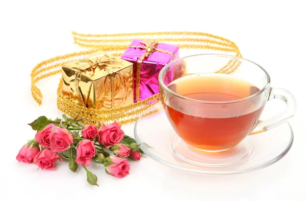 Tee und Rosen lizenzfreie Stockbilder