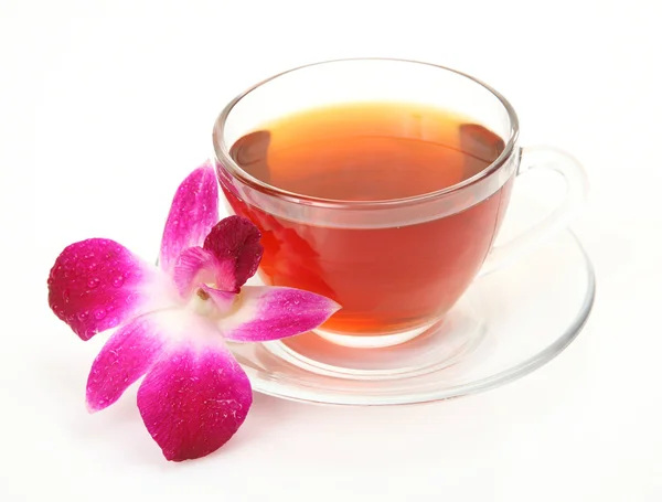 Tea and pink orchid — Stock Photo, Image