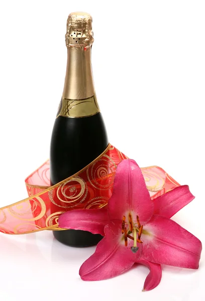 Pink flower and champagne — Stock Photo, Image