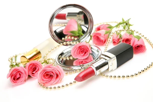 Decorative cosmetics and roses — Stock Photo, Image