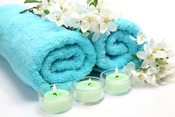 Towel and candles — Stock Photo, Image