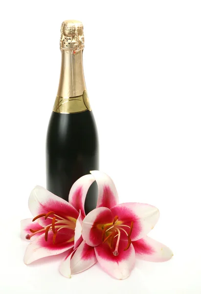 Wine and lilies — Stock Photo, Image