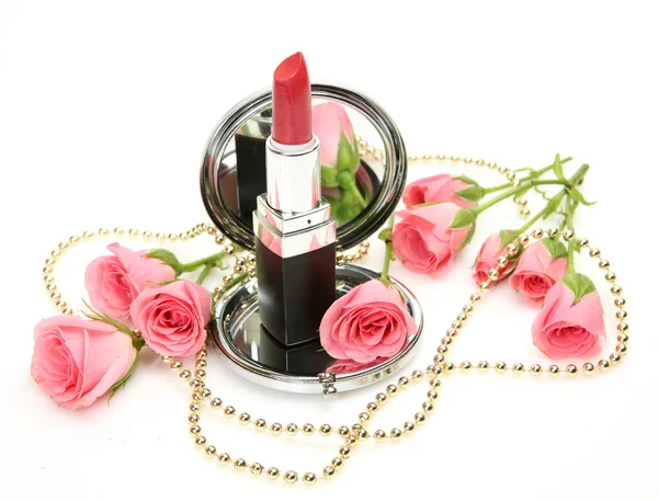 Dekorativní kosmetiky a růže Stock Fotografie