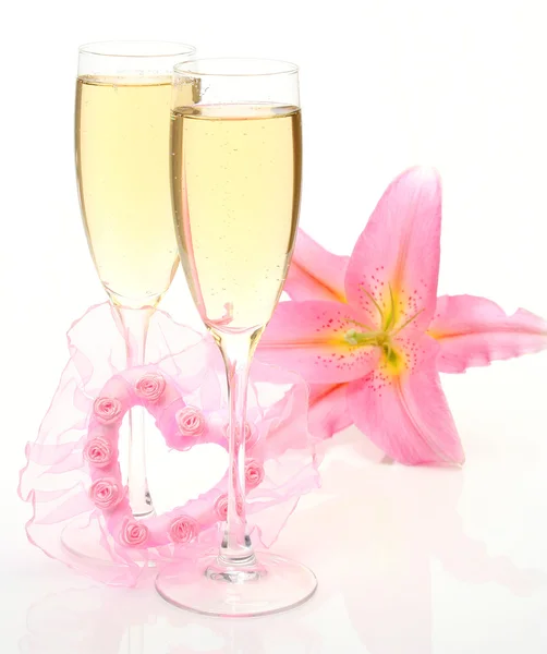 Champagne and pink lily — Stock Photo, Image