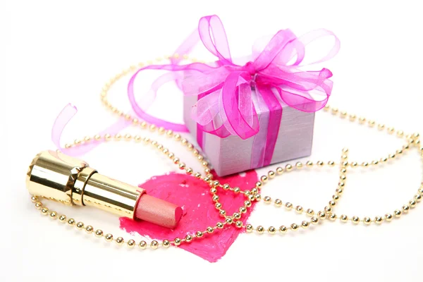 Lipstick and gift — Stock Photo, Image