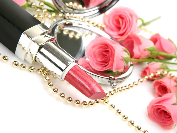 Pink lipstick and roses — Stock Photo, Image