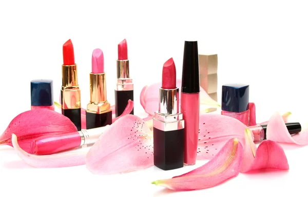 Petals and decorative cosmetics — Stock Photo, Image