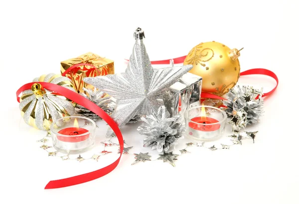 New Year's ornaments and candles — Stock Photo, Image