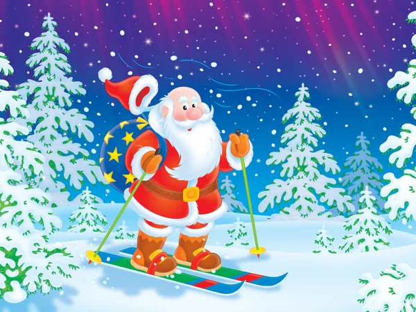 Santa claus skiën met een zak speelgoed — Stockfoto