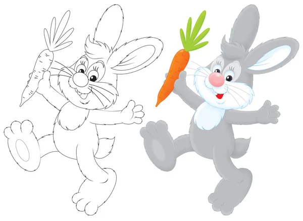 Кролик с морковкой — стоковое фото