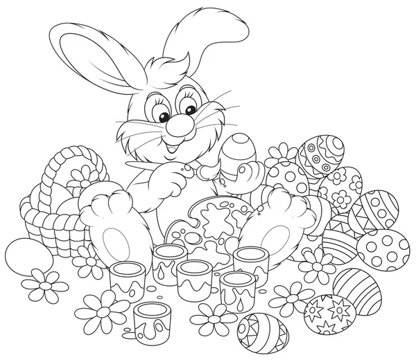 Easter Bunny painting Easter eggs to the upcoming holiday — Stock Vector