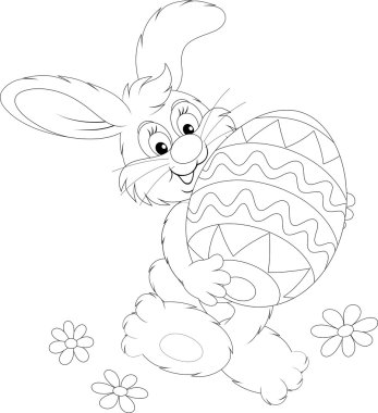 dekore edilmiş bir easter egg taşıyan Paskalya tavşanı