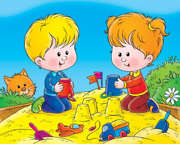 Jongen en meisje maken zandkastelen met emmers in een zandbak. — Stockfoto