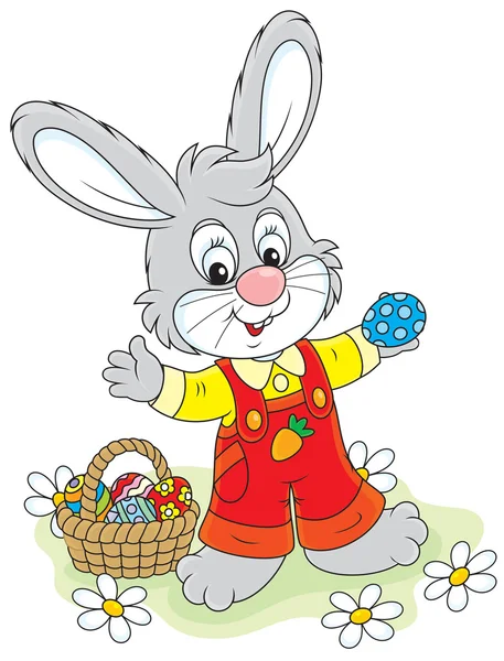 Easter Bunny with a basket of eggs — Stock Vector