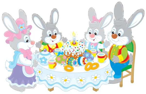 Conejitos de Pascua en la mesa festiva — Vector de stock