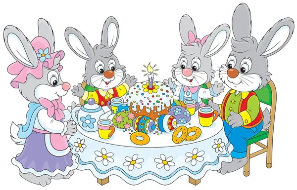 Easter bunnies at the festive table — Stock Vector