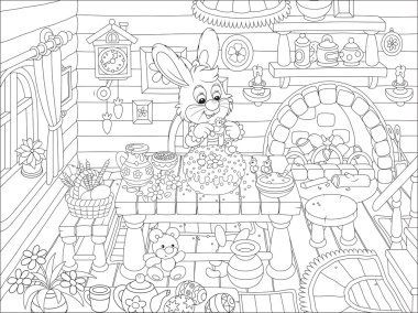 Paskalya tavşanı bir tatil kek pişiriyor.