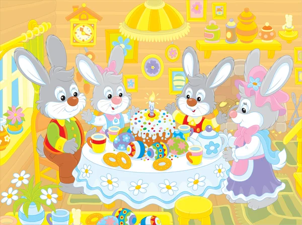 Conejitos de Pascua en la mesa festiva — Vector de stock