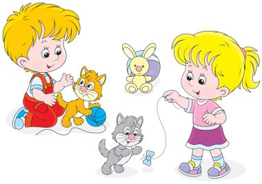 Çocuk yavru kedi ile oyun