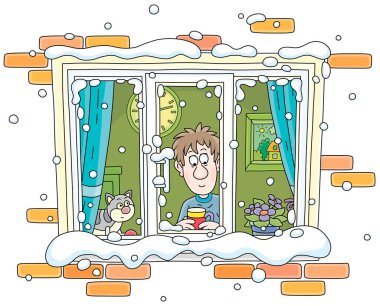 Komik kedisi ile neşeli çocuk sıcak çay içiyor, karlı bir pencereden dışarı bakıyor ve soğuk bir kış gününde uçan kar tanelerini seyrediyor, vektör karikatür çizimleri beyaz arka planda izole edilmiş.