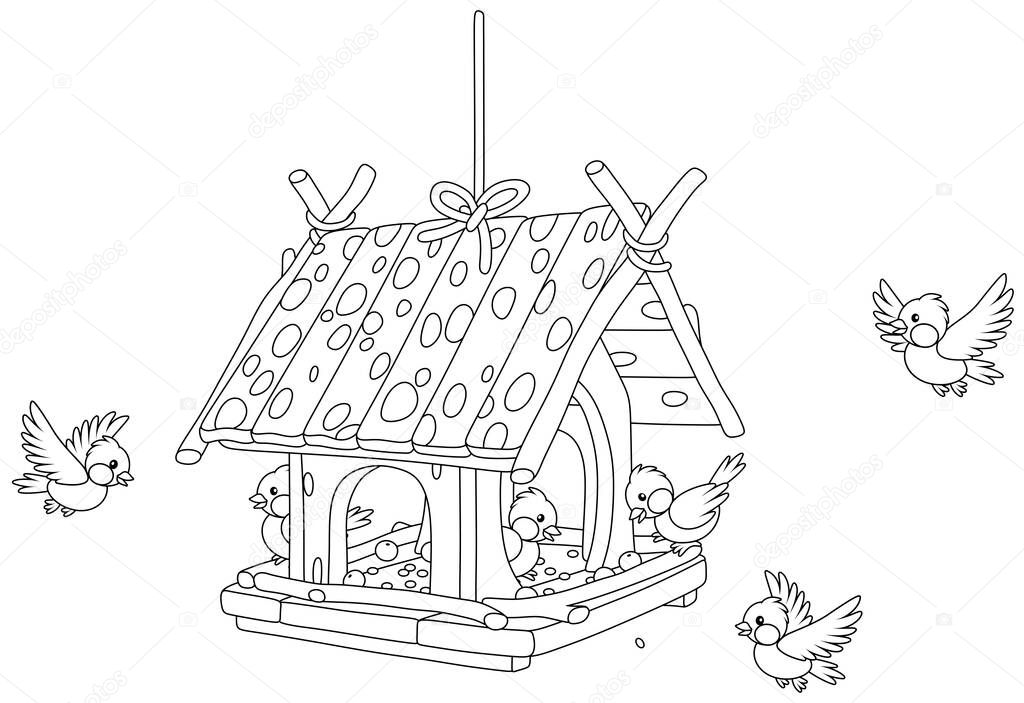 Merry small sparrows and titmice flying around a fancy birdfeeder hanging on a branch, black and white outline vector cartoon illustration for a coloring book page