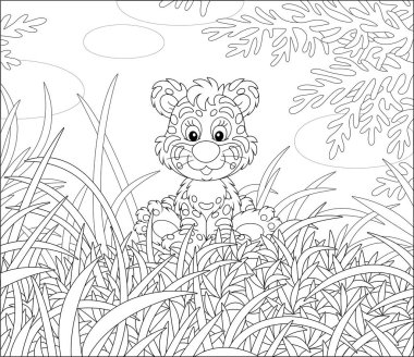 Friendly smiling cute baby tiger sitting on thick grass of a pretty forest glade on a beautiful sunny day, black and white outline vector cartoon illustration for a coloring book page