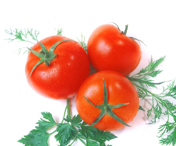 Tomatoes abd garden-stuff isolated on white — Stock Photo, Image
