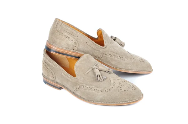 Paar elegante leichte Schuhe auf weißem Holzboden — Stockfoto