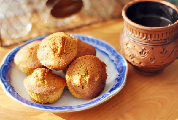 Cupcakes and tea at the kitchen table