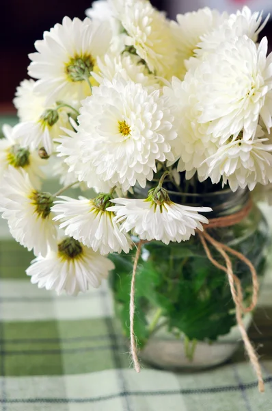 Still life of chrysanthemums in small vase. Rustic style — Stock Photo, Image