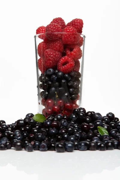 Glass with berries — Stock Photo, Image