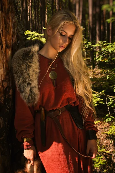 Scandinavian girl with fur skins — Stock Photo, Image