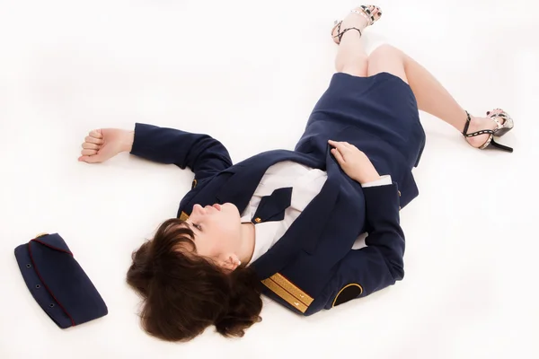 Woman officer lying on a floor — Stock Photo, Image