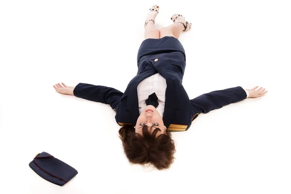 Жінка-офіцер лежить на підлозі — стокове фото