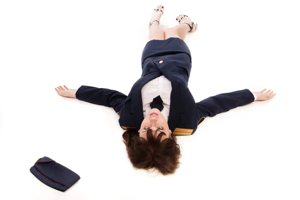 Woman officer lying on a floor — Stock Photo, Image