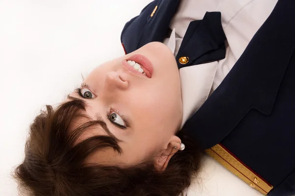 Kvinna officer liggande på ett golv — Stockfoto