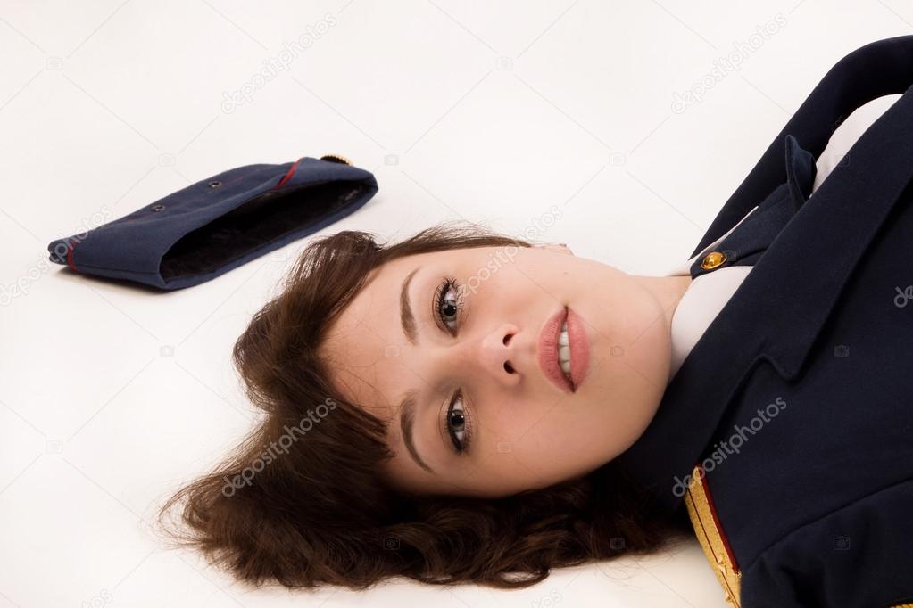 Woman officer lying on a floor