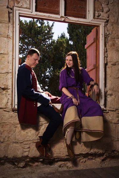 Couple in a medieval suit — Stock Photo, Image
