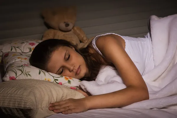 Sensual girl sleeping in the bedroom — Stock Photo, Image