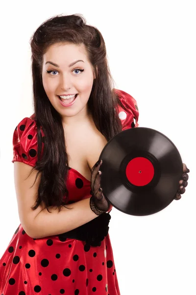 Pin-up girl with a plate — Stockfoto