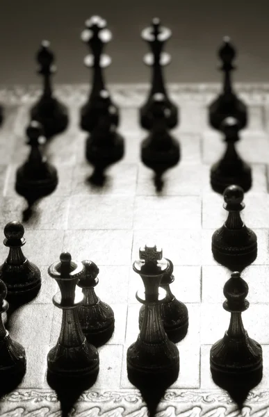 Figur na szachownicy — Zdjęcie stockowe