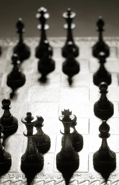 Chessmen on a chessboard — Stock Photo, Image