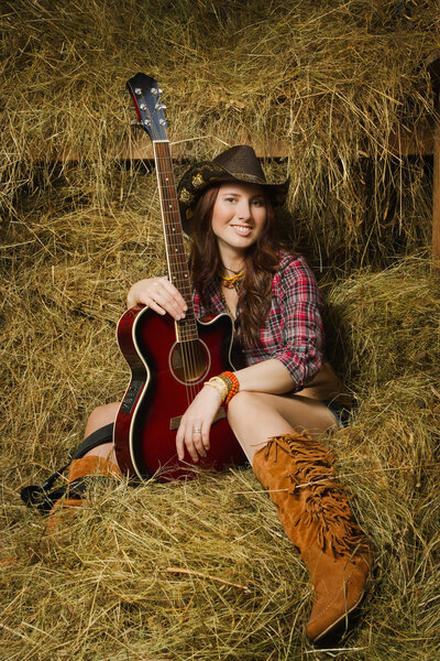 Country girl with guitar