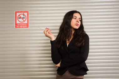 Business woman smokes clipart
