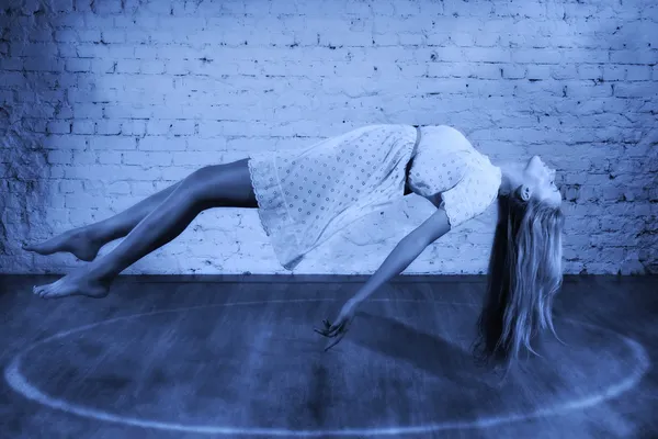 Magic moment - girl levitates — Stock Photo, Image