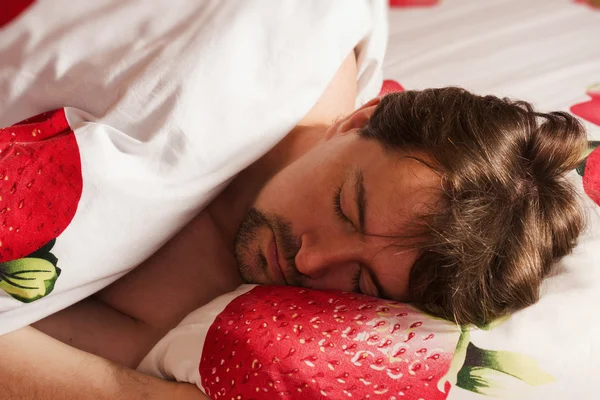 Man sleeping in bed — Stock Photo, Image