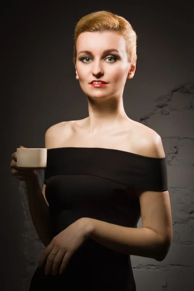 Retro styled fashion portrait of a woman Stock Picture