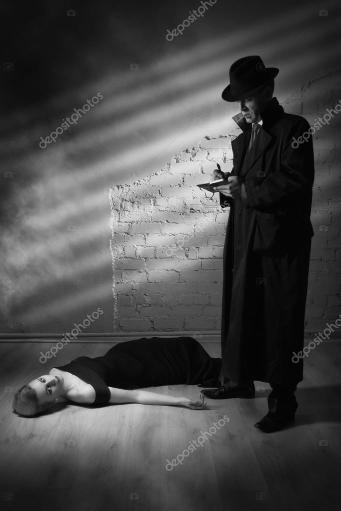 Detective investigating the crime scene Stock Photo by ©Demian 39241281
